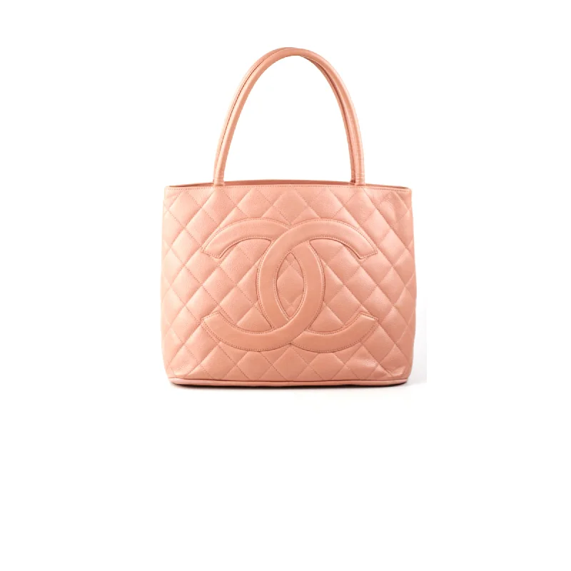 Handle bags with woven designs for a rustic and natural vibe-Chanel Medallion Tote Pink