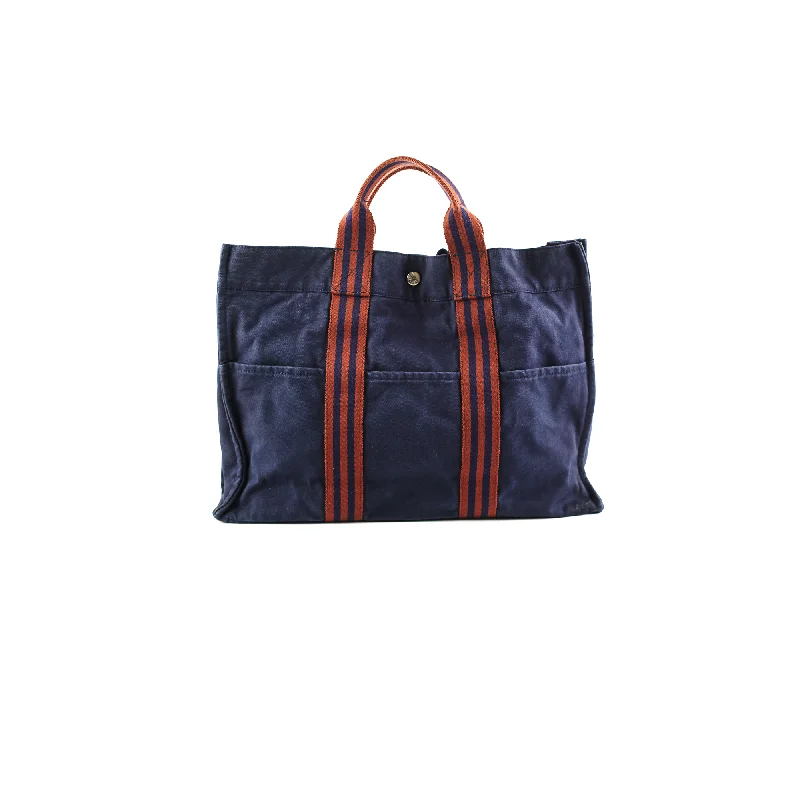 Best handle bags with vintage-inspired designs for a retro, timeless style-Hermes Canvas Tote Navy