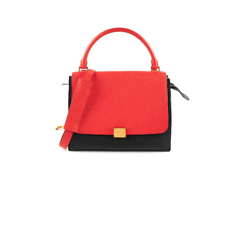 Handle bags with unique knot details for an artistic and sophisticated touch-Celine Trapeze Coral/Black Small