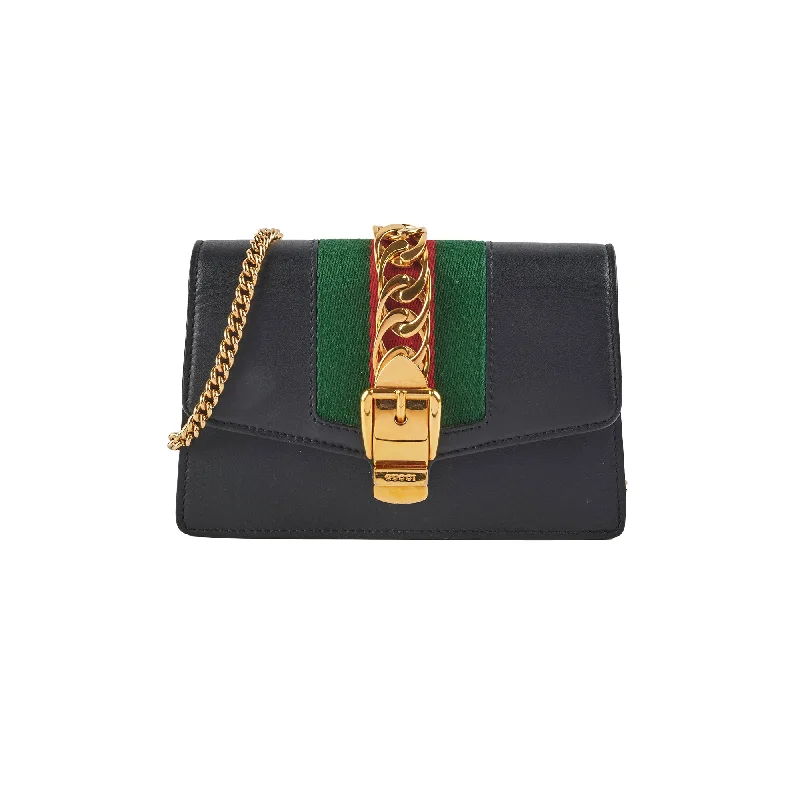 Handle bags with sleek, metal frame designs for a structured, high-fashion appeal-Gucci Supermini Sylvie Chain Bag Black