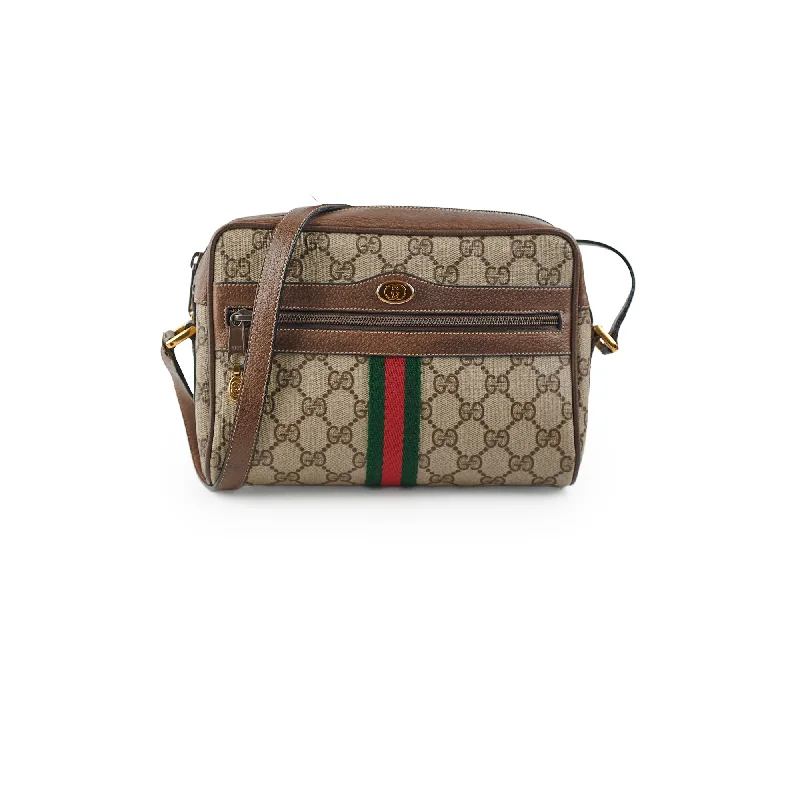 Handle bags with vibrant, patterned fabrics for a fun and energetic appearance-Gucci Monogram Messenger Crossbody Bag