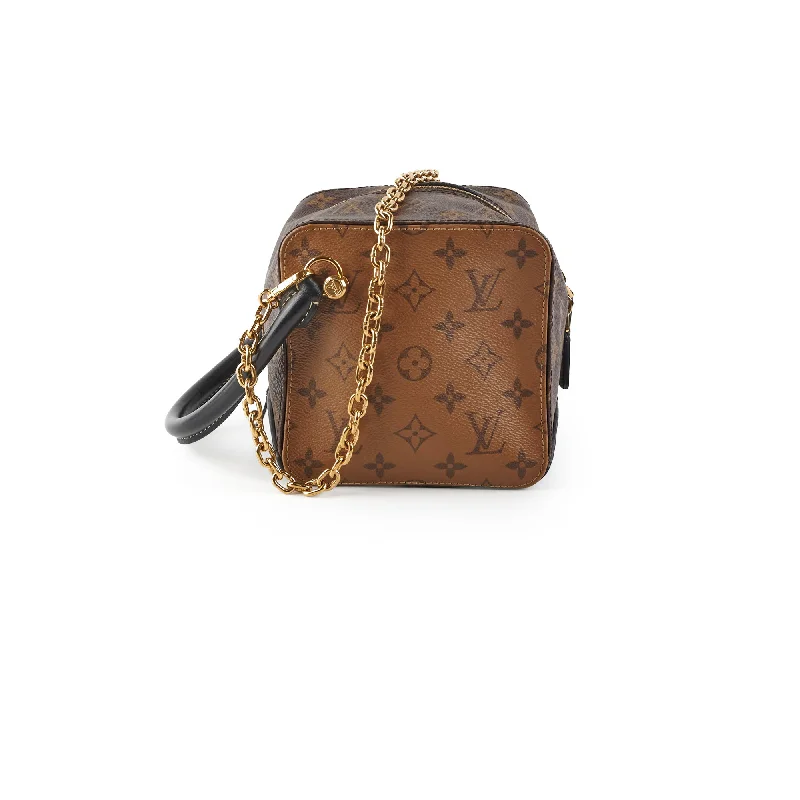 Stylish handle bags with boho-inspired designs for a relaxed, carefree vibe-Louis Vuitton Cube Reverse Monogram