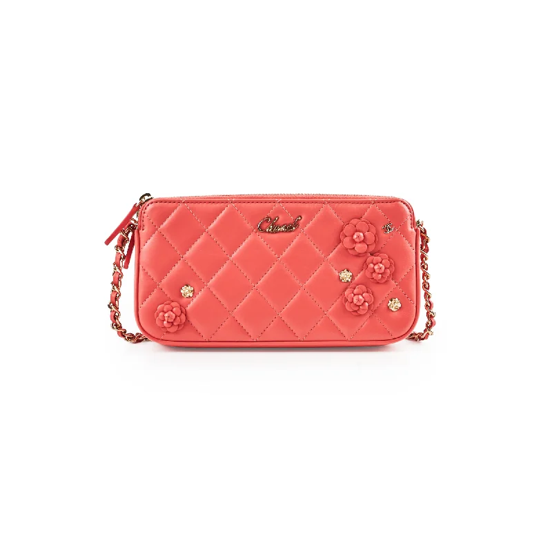 Handle bags with floral prints for a feminine and playful aesthetic-Chanel Small Camelia CC Clucth with Chain Coral