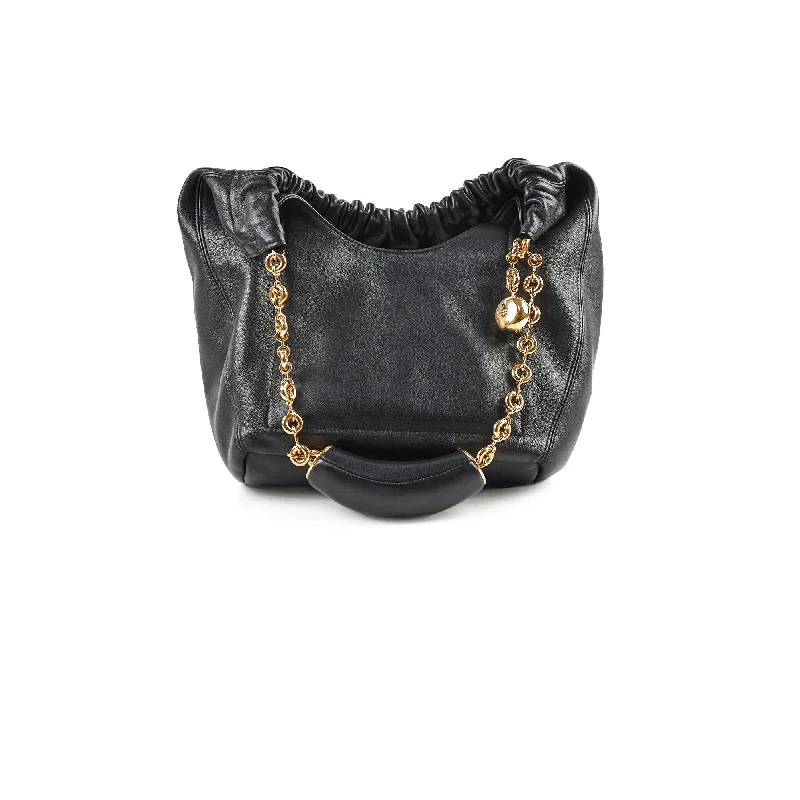 Handle bags with metallic accents for a touch of glamour and shine-Loewe Squeeze Small Bag Black