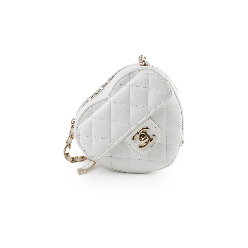 Handle bags with large, front flaps for a stylish and functional closure option-Chanel Mini Heart Bag White 32 Series