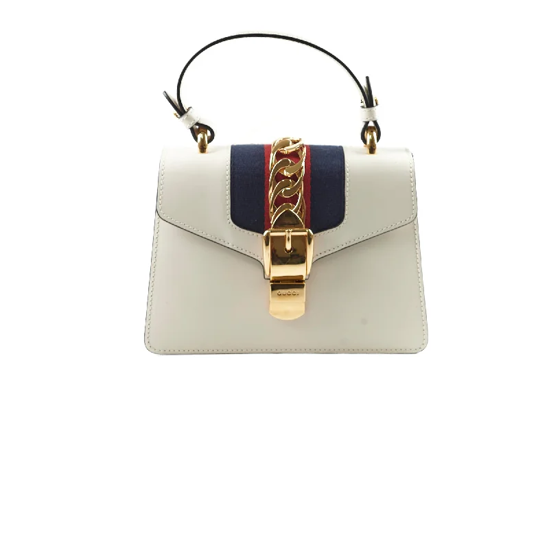 Handle bags with large, front flaps for a stylish and functional closure option-Gucci Sylvie White Mini Top Handle Crossbody Bag