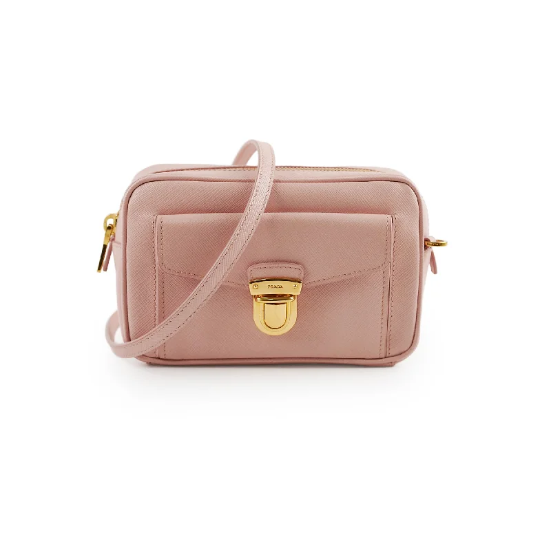 Handle bags with leather accents for a chic and classic look-Prada Mini Pink Saffiano Camera Crossbody