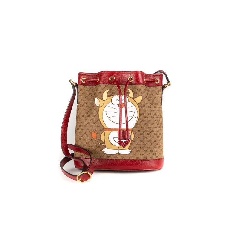 Handle bags with vibrant, patterned fabrics for a fun and energetic appearance-Gucci x Doraemon Bucket Bag Red