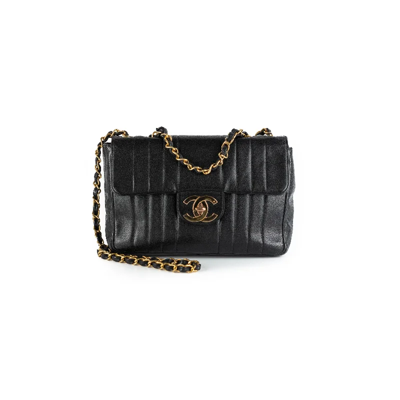 Best handle bags with crossbody options for an additional hands-free carrying option-Chanel CC Vertical Jumbo Flap Caviar Black