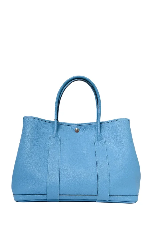 Tote bags with playful pom-poms for charm -Hermès 2014 Blue Clemence Leather Garden Party Tote