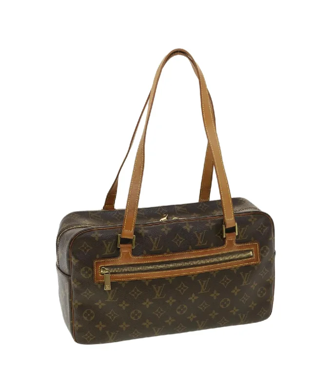 Handle bags with vibrant, patterned fabrics for a fun and energetic appearance-Monogram Canvas Hand Bag with Accessories