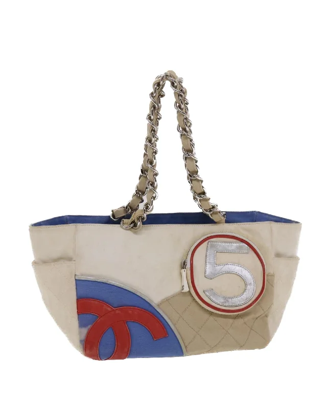 Trendy handle bags with bold colors for a fashionable and eye-catching design-White Canvas Chain Tote Bag with CC Logo