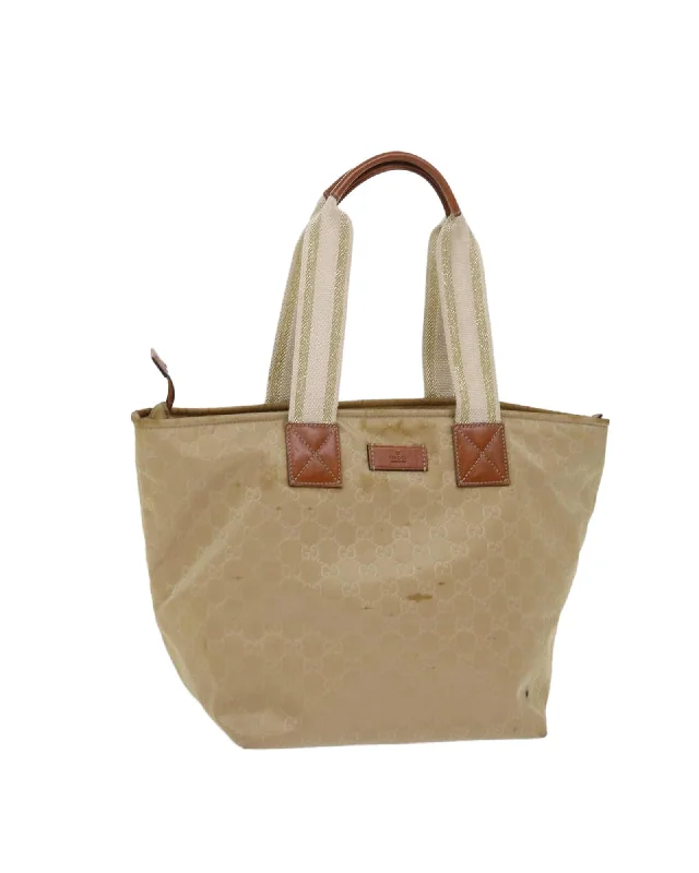 Best handle bags with playful tassel accents for a fun and trendy style-GG Canvas Tote Bag in Beige by Italian Designer