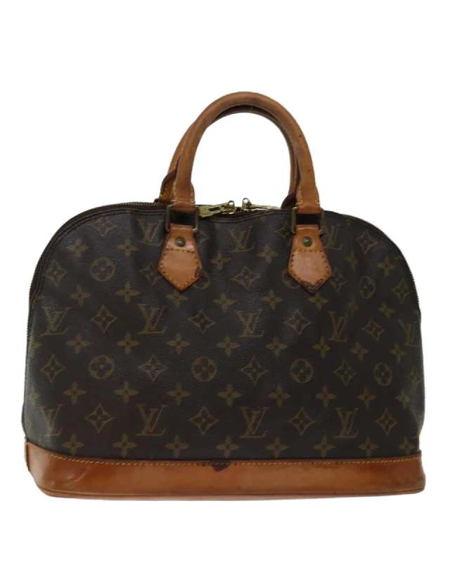 Handle bags with sleek, metal frame designs for a structured, high-fashion appeal-Monogram Canvas Hand Bag with Accessories - Authentic LV