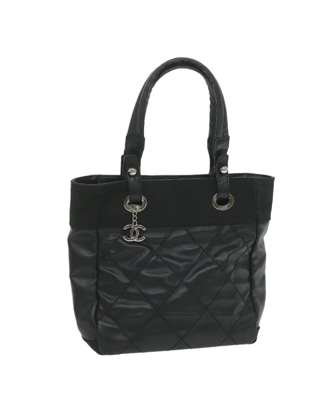 Handle bags with large, front flaps for a stylish and functional closure option-Coated Canvas Parisian Tote with CC Logo