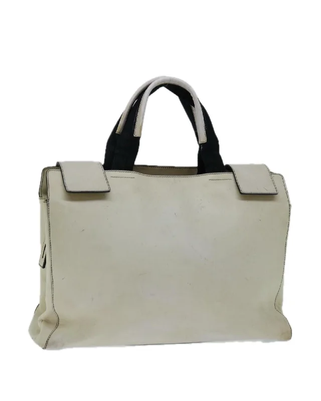 Handle bags with sleek, metal frame designs for a structured, high-fashion appeal-White Leather Hand Bag with Accessories