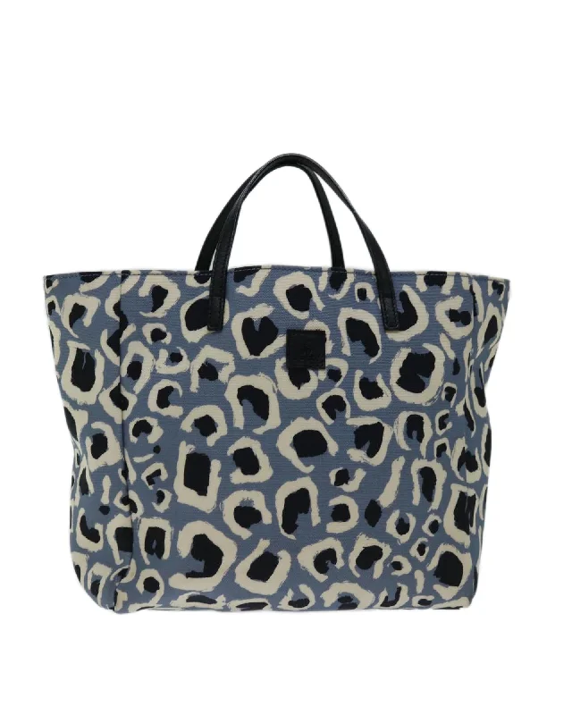 Handle bags with tropical-inspired prints for a vacation-ready, summery look-Leopard Print Canvas Handbag with Blue Accents