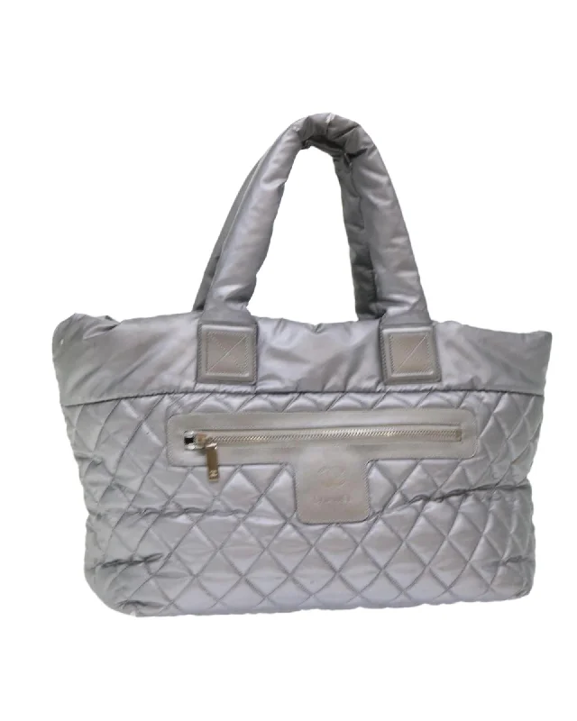 Handle bags with sturdy, durable handles for comfortable and long-lasting wear-Nylon Silver Hand Bag with CC Logo