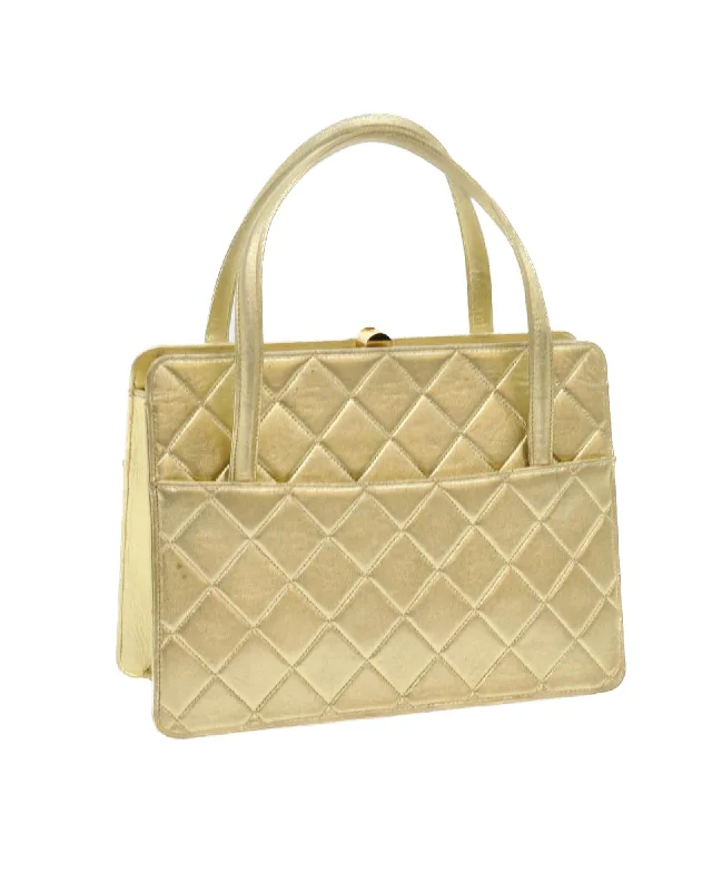 Best handle bags with matching accessories like wallets for a coordinated set-Gold Tone Lamb Skin Hand Bag with CC Logo