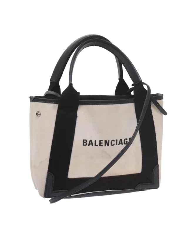 Handle bags with woven designs for a rustic and natural vibe-Canvas Hand Bag with Shoulder Strap - Black and White