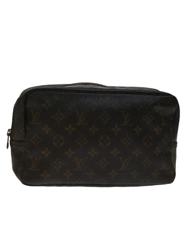 Best handle bags with bold, oversized buckles for a fashionable and statement-making design-Monogram Canvas Clutch Bag