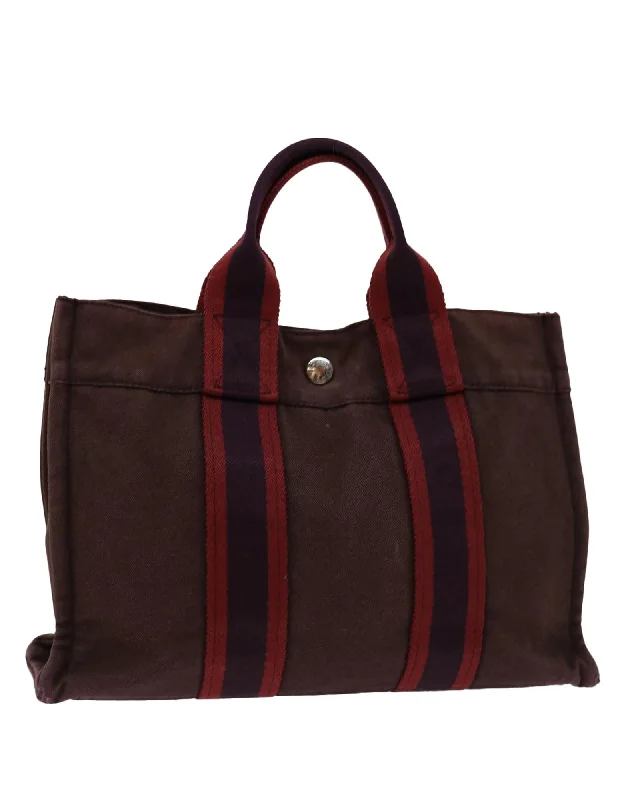 Handle bags with large front pockets for quick and easy access to essentials-Canvas Hand Bag with Red Hue and Multiple Compartments