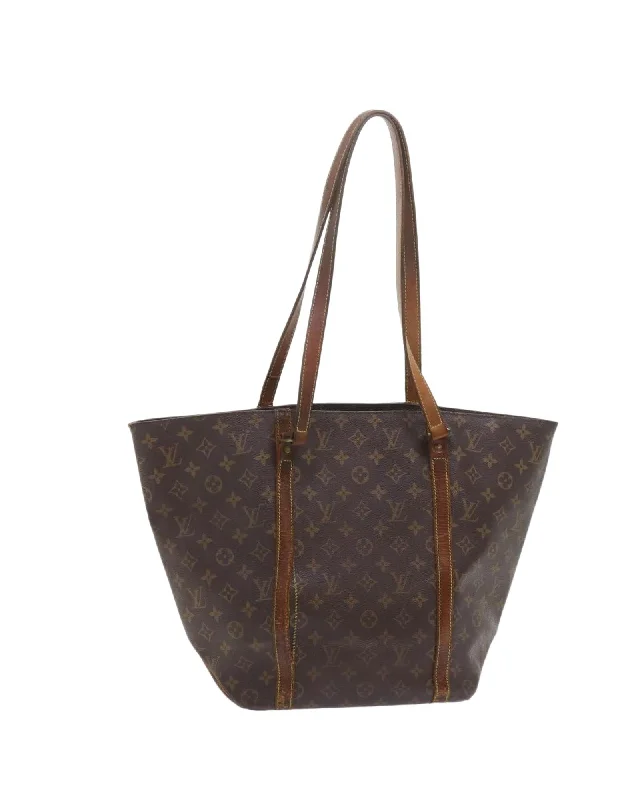 Handle bags with metallic finishes for a shiny, glamorous touch-Monogram Canvas Tote Bag with Shoulder Strap