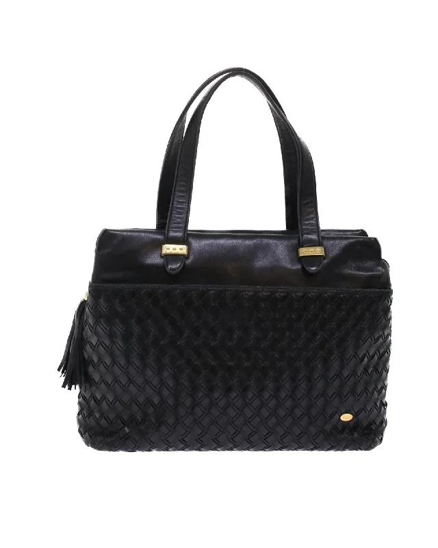 Handle bags with floral prints for a feminine and playful aesthetic-Black Leather Hand Bag