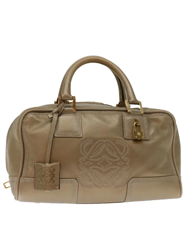 Best handle bags with leather and suede mix for a stylish and durable choice-Gold Leather Hand Bag with Lock and Key