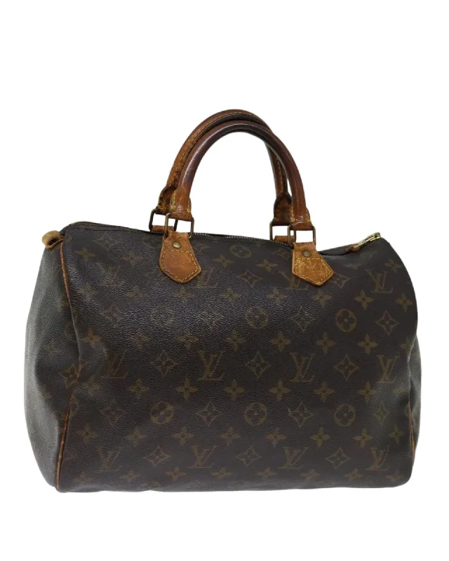 Best handle bags with patent leather for a shiny, high-gloss finish-Monogram Canvas Hand Bag with Accessories and Serial No.